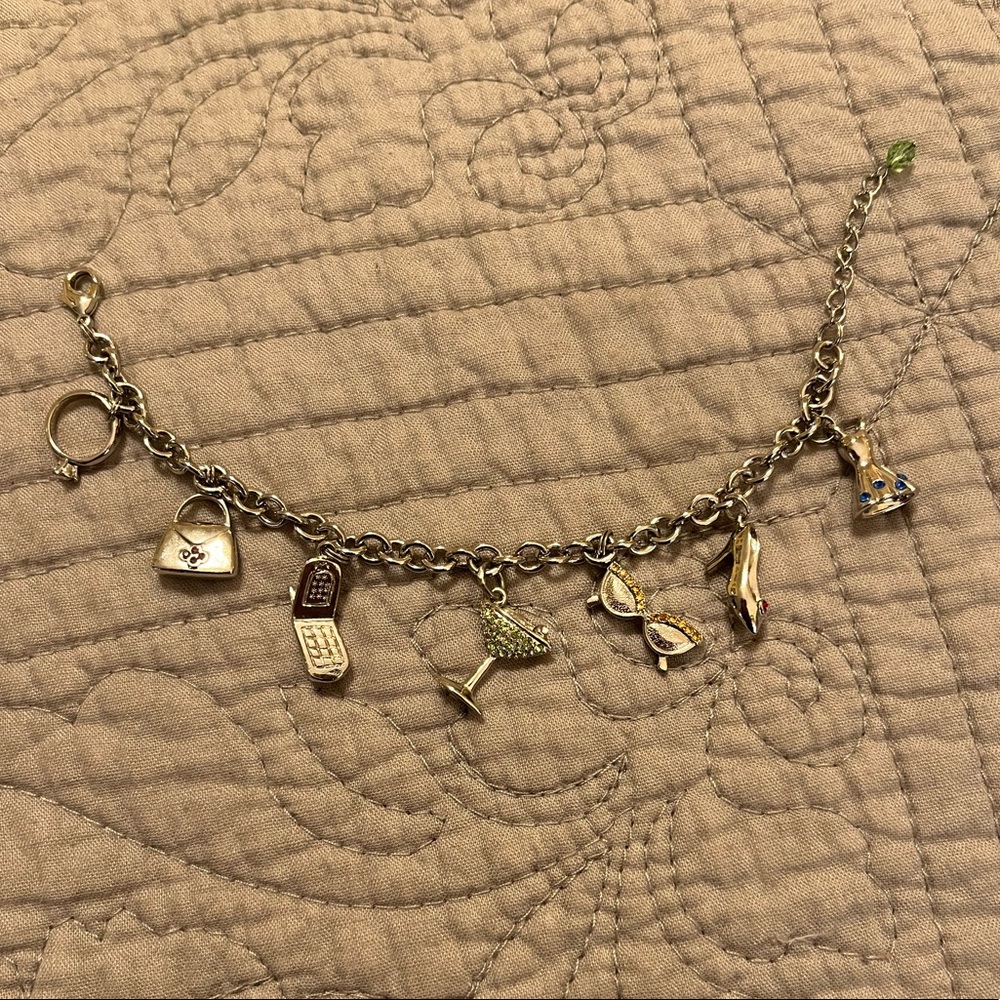 Charm bracelet. Silver tone.  7-8”. Great condition